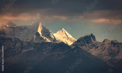 Himalayan peaks Nanda Devi and Nanda Khat at sunset as viewed on trek at Uttarakhand India. © Roop Dey