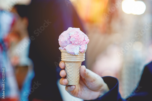Hand and vanilla ice cream, delicious dessert Useful food concept With copy space