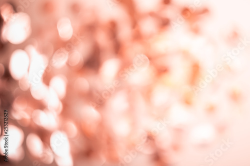 White and coral bokeh lights. Abstract blurred light background