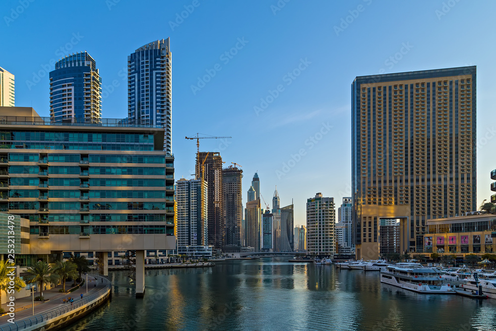 Fototapeta premium Dubai marina towers, boats and skyscrapers