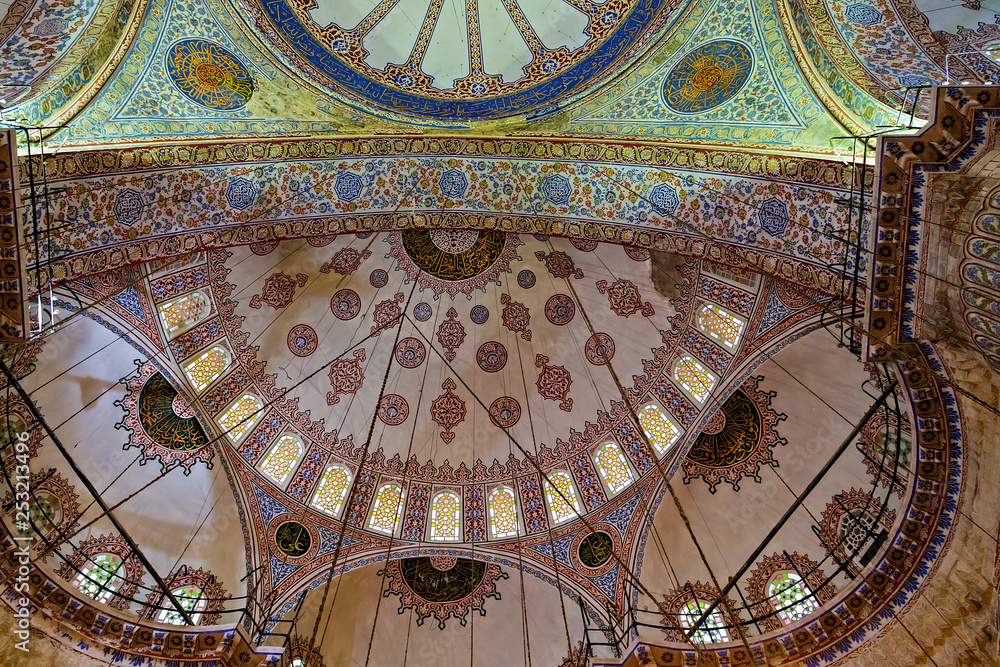 Ceramic Blue tile with colorful patchwork dome and praying area, interior side view Blue Mosque.