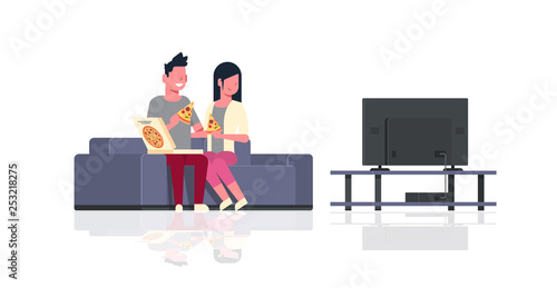 happy couple eating pizza man woman watching tv sitting on couch holiday relax concept male female cartoon characters full length flat horizontal isolated