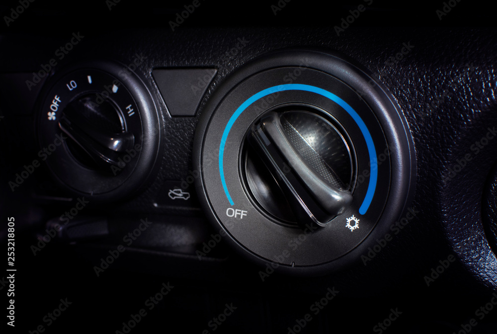 Air conditioner button for temperature climate adjustment in a car. Air conditioner button for temperature climate adjustment in a car.