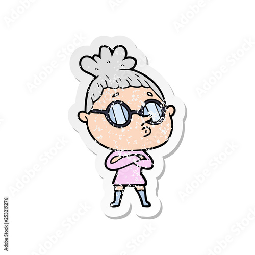 distressed sticker of a cartoon woman wearing glasses