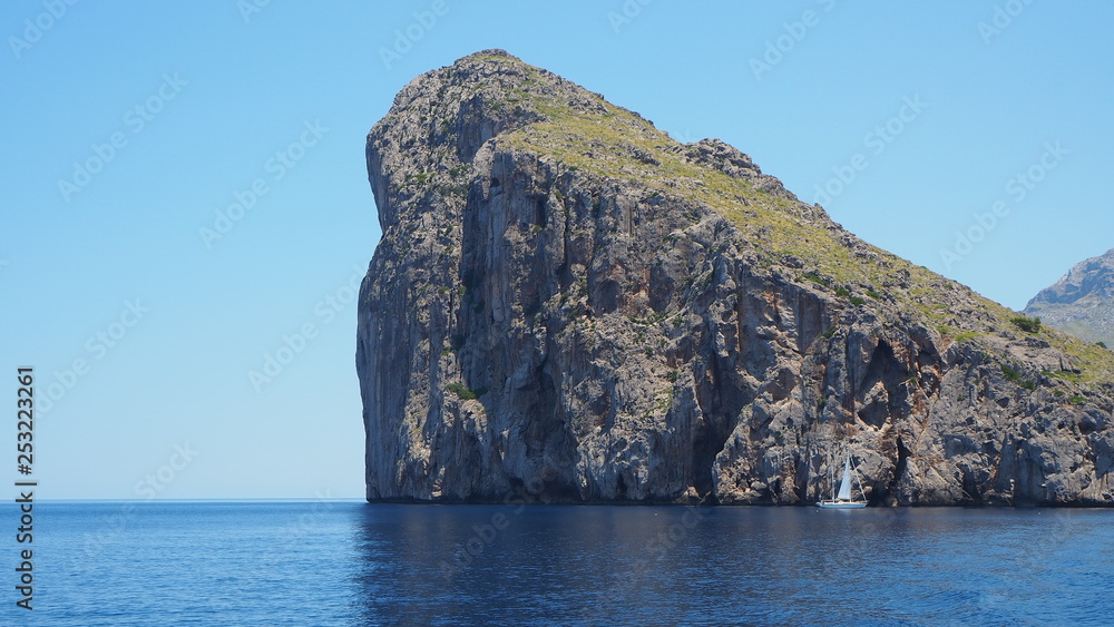 Fototapeta premium Views of the sea and the mountains while sailing with the ship between the Port of Sa Calobra and the port of Soller