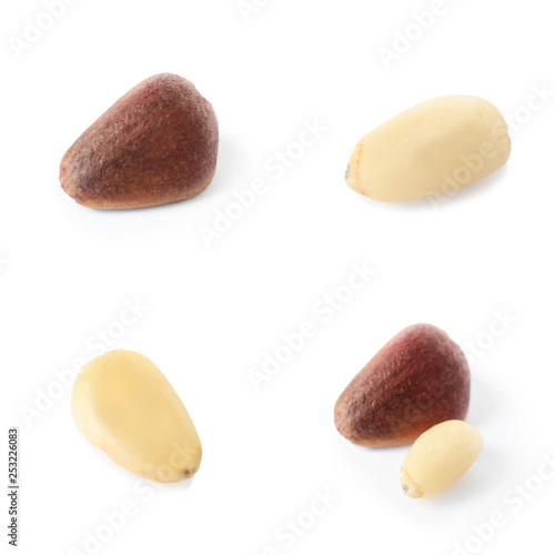 Set of different delicious organic pine nuts on white background