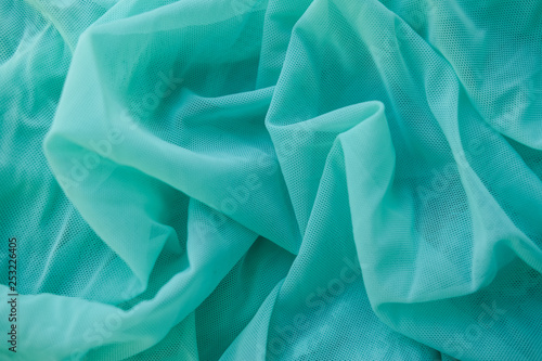 Fabric blue waves - material for background and texture.