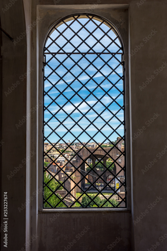 Italy, Rome cityscape viewed through a window