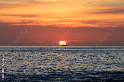 sunset over the sea © browneyefoto