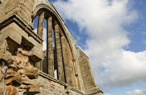 Egglestone Abbey is an abandoned Premonstratensian Abbey on the southern bank of the River Tees, south-east of Barnard Castle in County Durham, England. photo