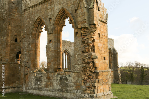 Egglestone Abbey is an abandoned Premonstratensian Abbey on the southern bank of the River Tees  south-east of Barnard Castle in County Durham  England.