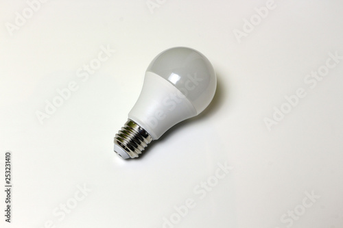Energy saving light bulb on white background isolated