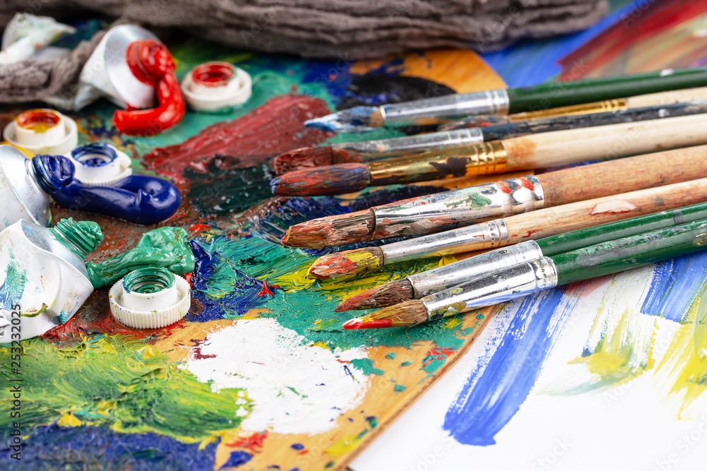 Paint brushes and paints for drawing. Paint brushes and paints for drawing.