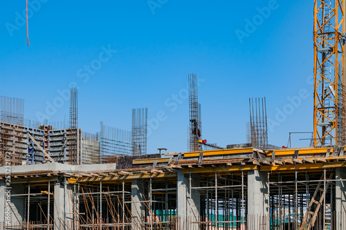 Building construction, start of construction against the blue sky