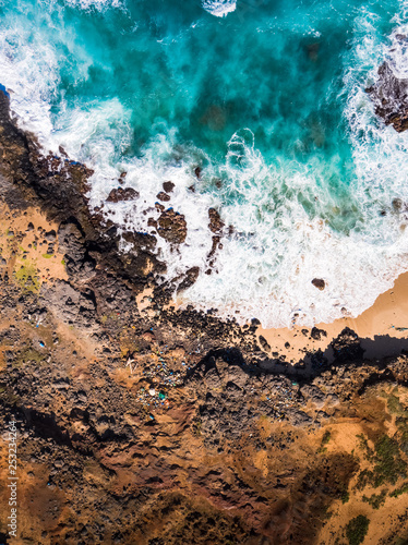 Aerial view of plastic pollution on isolated beach on Molokai