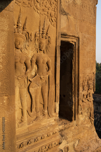 Apsara dancers reilef in Angkor Wat temple photo