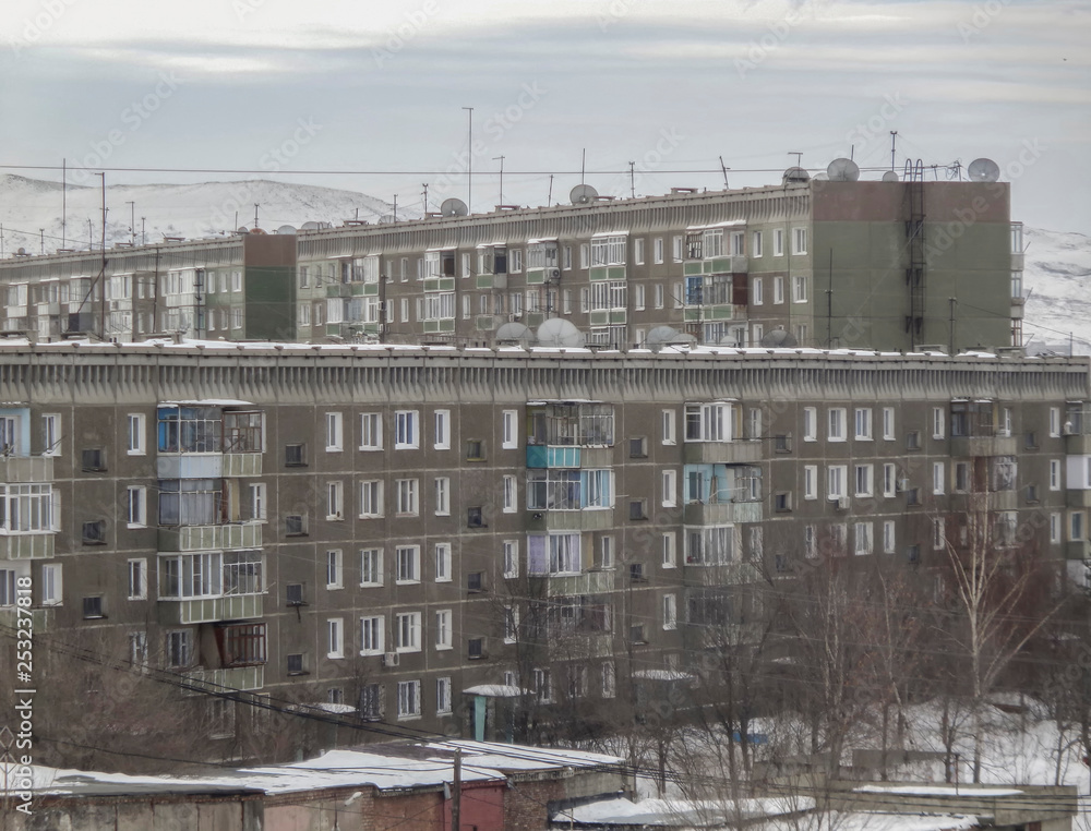 Soviet architecture. Ust-Kamenogorsk (Kazakhstan) Apartment buildings. Soviet architectural style. Residential buildings. Soviet built multistory apartment buildings. Gray
