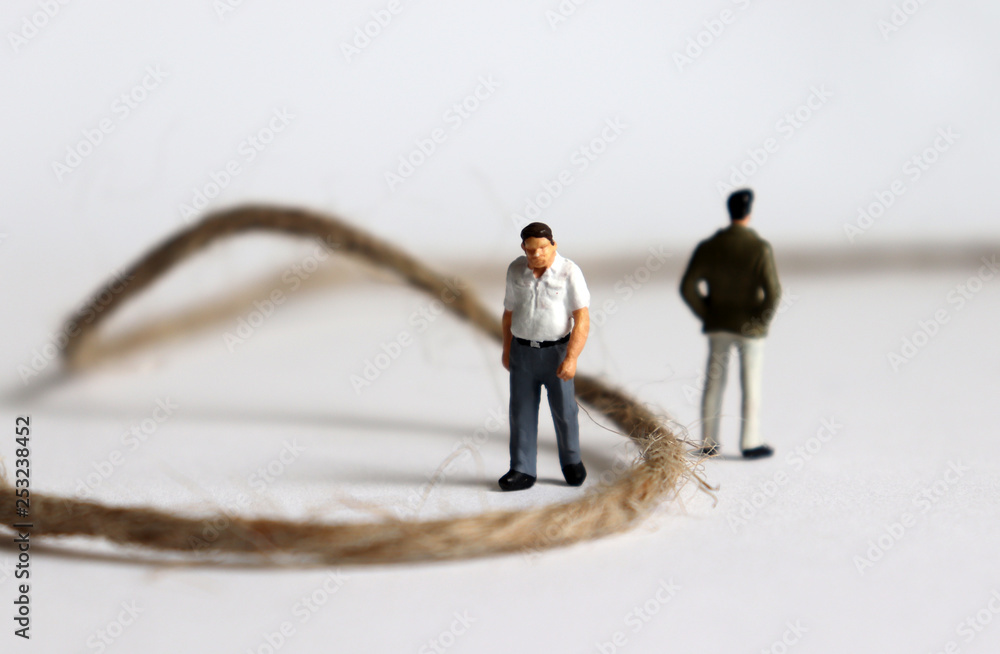 Miniature people. A concept of generational conflict. Miniature people. A concept of generational conflict.