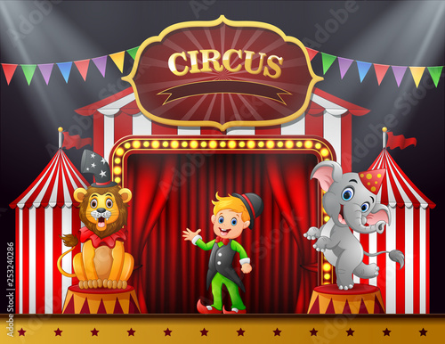 Circus trainer with elephant and lion on the stage © dreamblack46