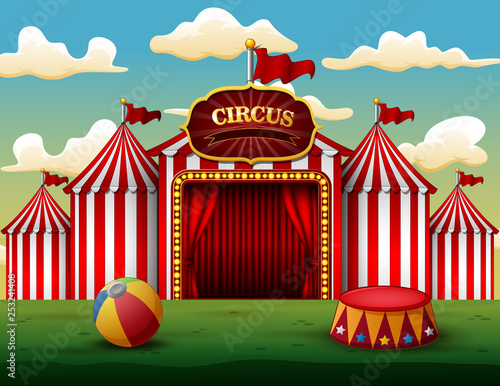 Classic red white circus tent with decorative sign board 