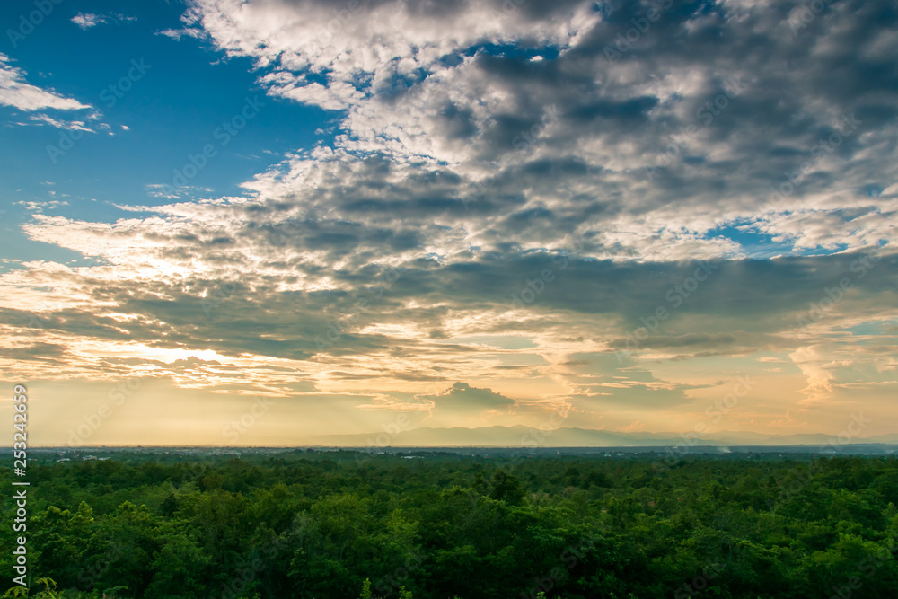 colorful dramatic sky with cloud at sunset.