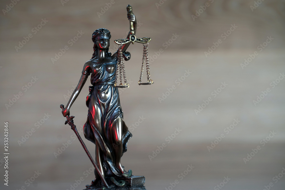 Fototapeta premium The Statue of Justice - lady justice or Iustitia / Justitia the Roman goddess of Justice