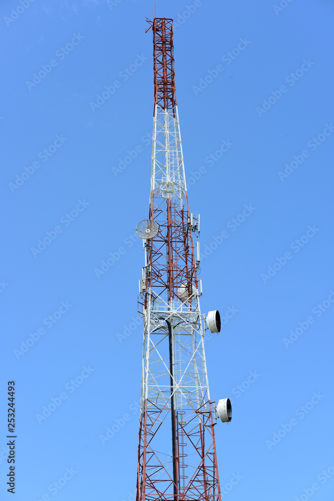 Wireless Communication Antenna With bright sky.Telecommunication tower with antennas with blue sky. Wireless Communication Antenna With bright sky.Telecommunication tower with antennas with blue sky.