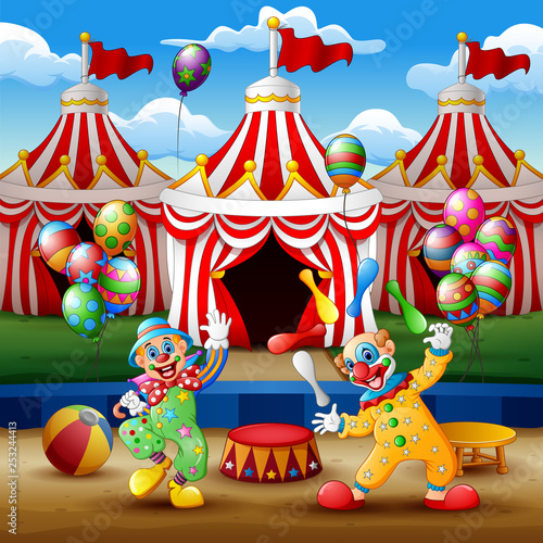 Cartoon clown show and acrobat performance at the arena