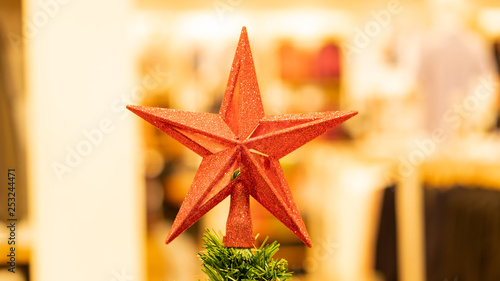 Red stars on the Christmas tree on