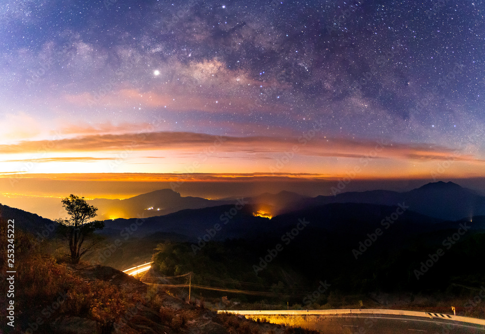 Panorama Milky Way Galaxy with light city at Doi inthanon Chiang mai, Thailand