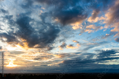 .colorful dramatic sky with cloud at sunset.