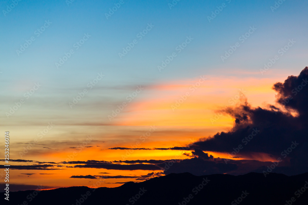 Fototapeta premium colorful dramatic sky with cloud at sunset.