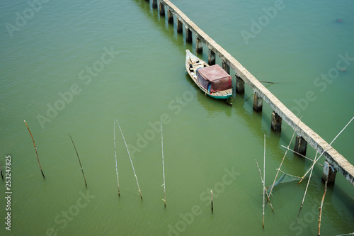 Aerial view of boat and floating dock  © kiet