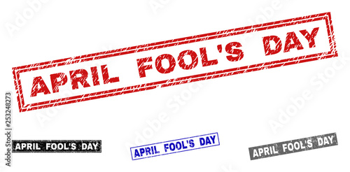Grunge APRIL FOOL'S DAY rectangle stamp seals isolated on a white background. Rectangular seals with grunge texture in red, blue, black and gray colors.