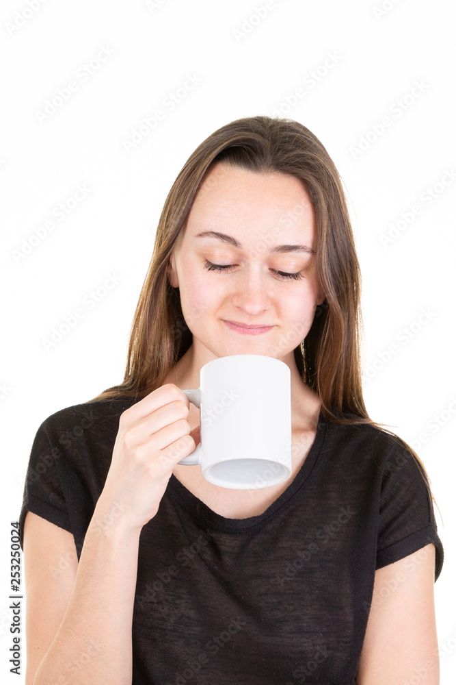 Happy attractive woman with eyes closed drinking cup of tea Happy attractive woman with eyes closed drinking cup of tea