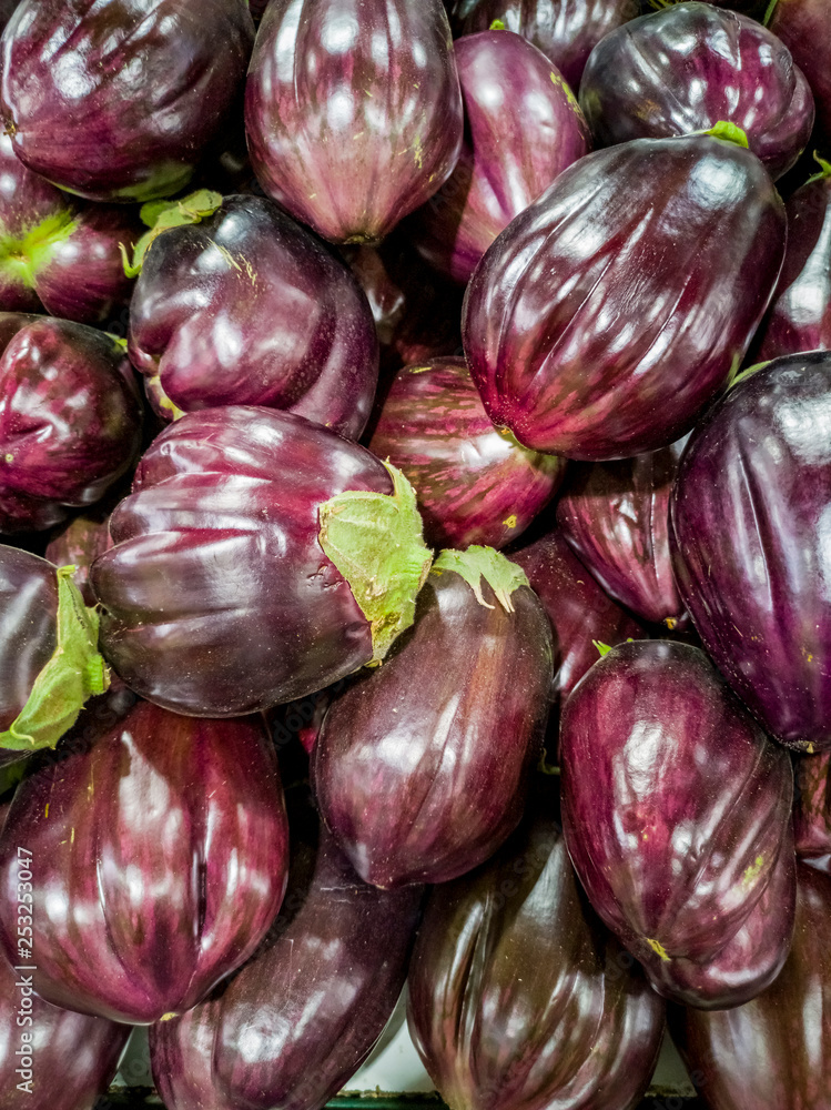 Pile of new sort of eggplant on Mediterranean market