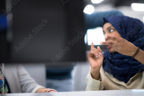 black muslim female software developer at work