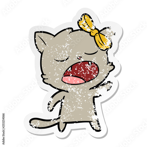 distressed sticker of a cartoon cat meowing