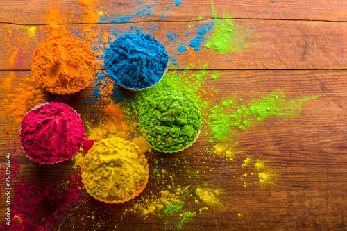 Holi color powder. Organic Gulal colours in bowl for Holi festival, Hindu tradition festive © Ruslan Gilmanshin