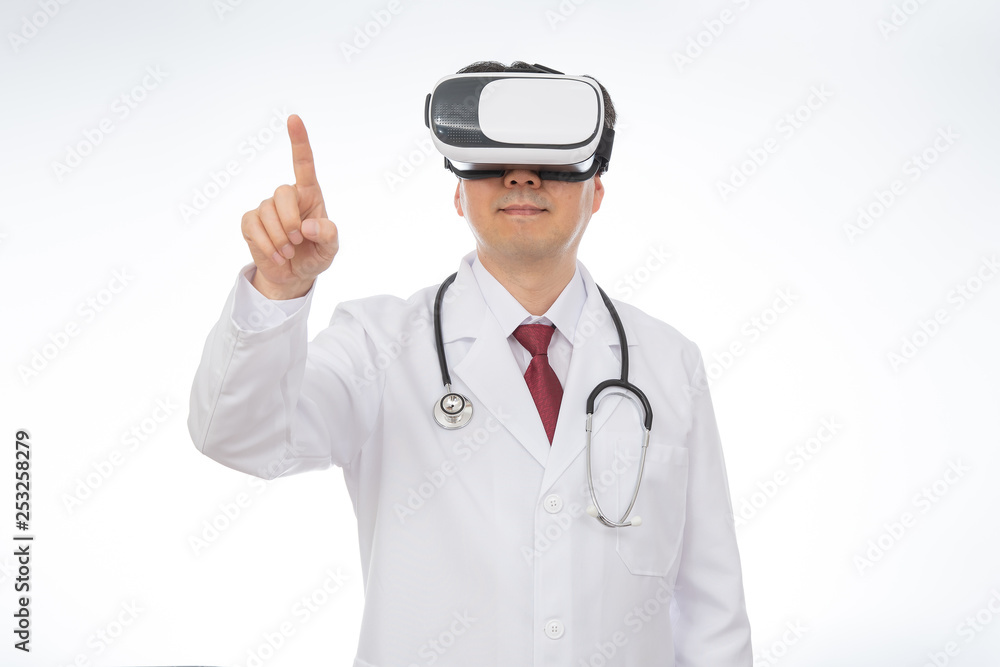 Male doctor wearing virtual reality glasses isolated on white background. Male doctor wearing virtual reality glasses isolated on white background.
