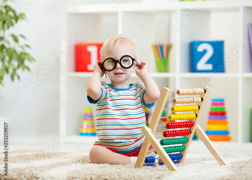 Funny child boy with eyegla...