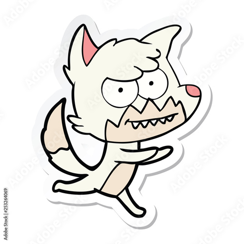 sticker of a cartoon grinning fox