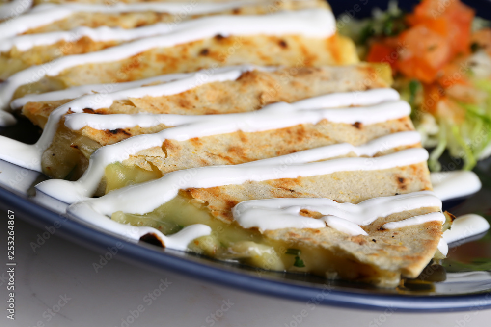 Quesadilla with cheese,mushroom,onions and salad Quesadilla with cheese,mushroom,onions and salad
