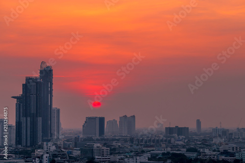 The background of the high angle view in the evening, overlooking the condominium that is under construction in a variety of heights, showing the habitat of the capital city. © bangprik
