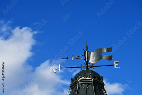 Foto wind vane on the classic roof