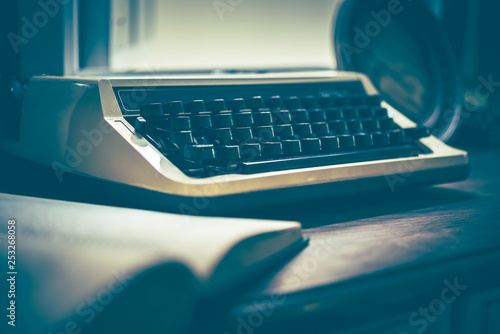 Fotografia Vintage typewriter on the table, touch-up in retro style
