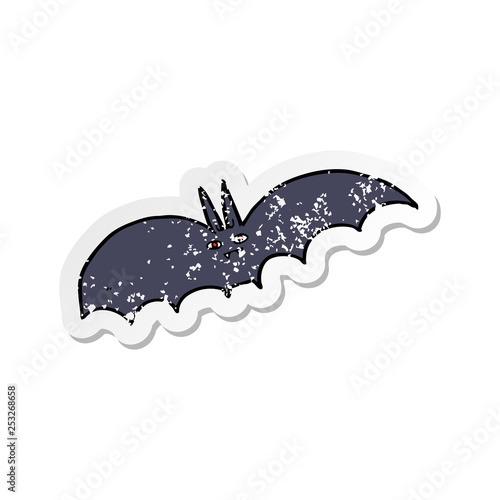 retro distressed sticker of a cartoon vampire bat