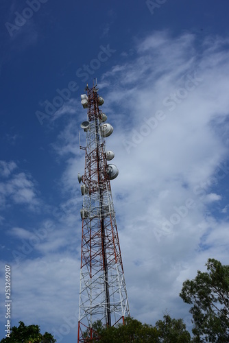 High pole for signal transmission. There are both wireless phone systems and microwave systems. Microwave system.Wireless Communication Antenna With bright sky.Telecommunication tower with antennas.