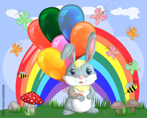 Cute cartoon bunny with an armful of balls on a glade near the rainbow. Spring, postcard