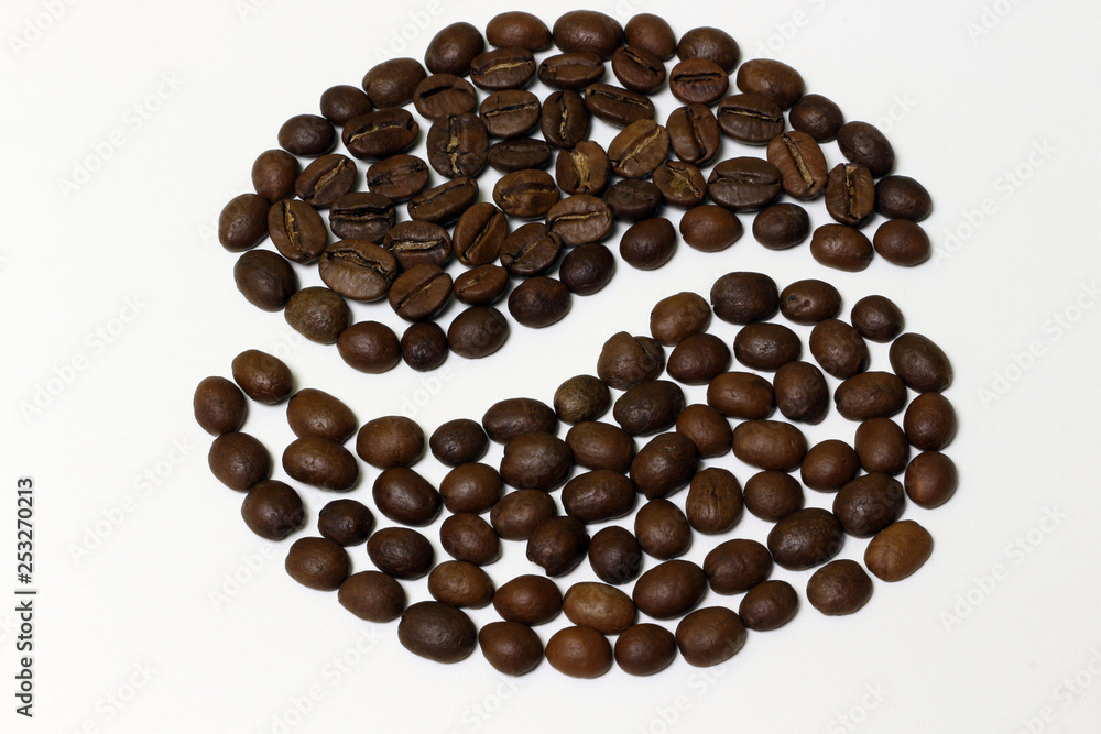 Roasted coffee beans isolated on white background. Roasted coffee beans isolated on white background.
